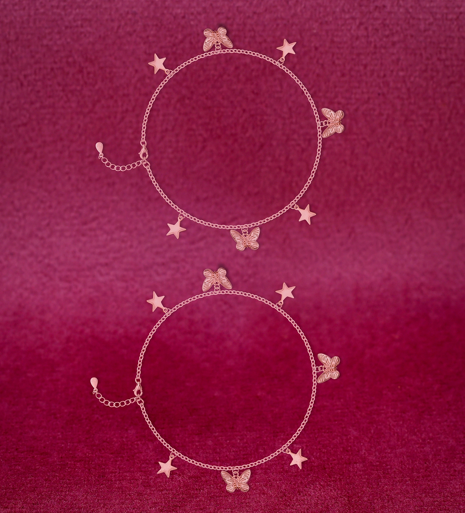 925 sterling silver rose gold butterfly star charm anklet on maroon background — Ross Jewells style no PL92/8199 925 sterling silver rose gold butterfly star charm anklet on maroon background — Ross Jewells style no PL92/8199