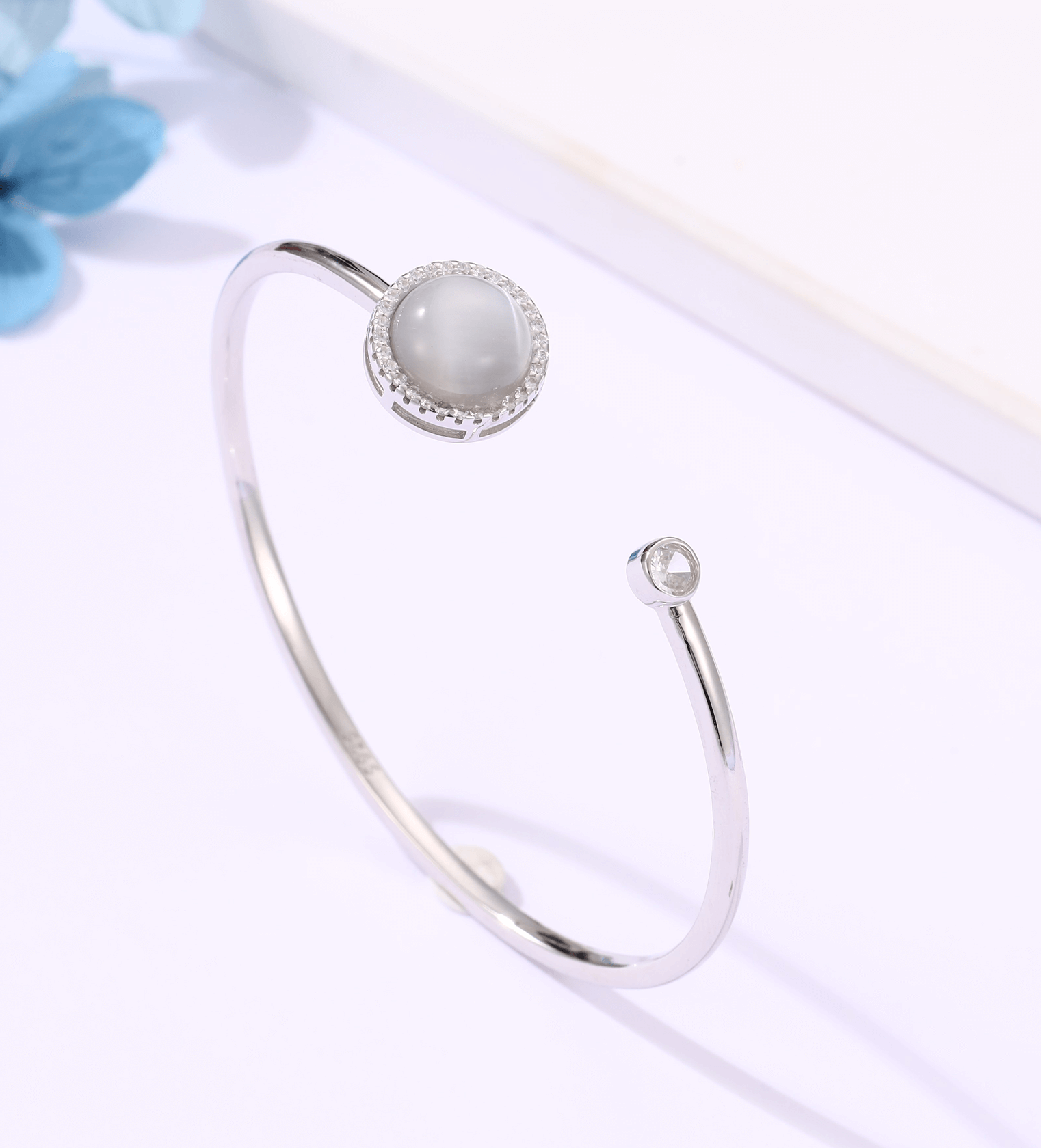 Side view of Aurora Shine 925 sterling silver bracelet showing stone prong setting — Ross Jewells